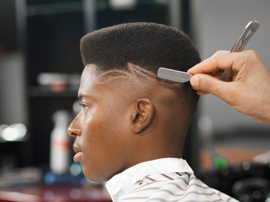 “Curly-Flat-Top-with-design-shave”