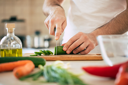 Men cooks healthy food